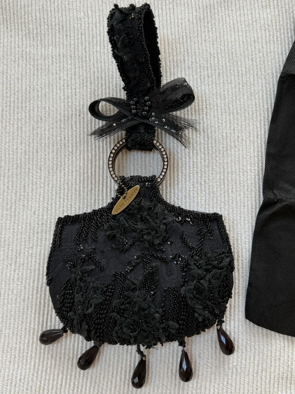 Mary Frances Black Beaded Wristlet Clutch with Rhinestone Ring & Bow Accent